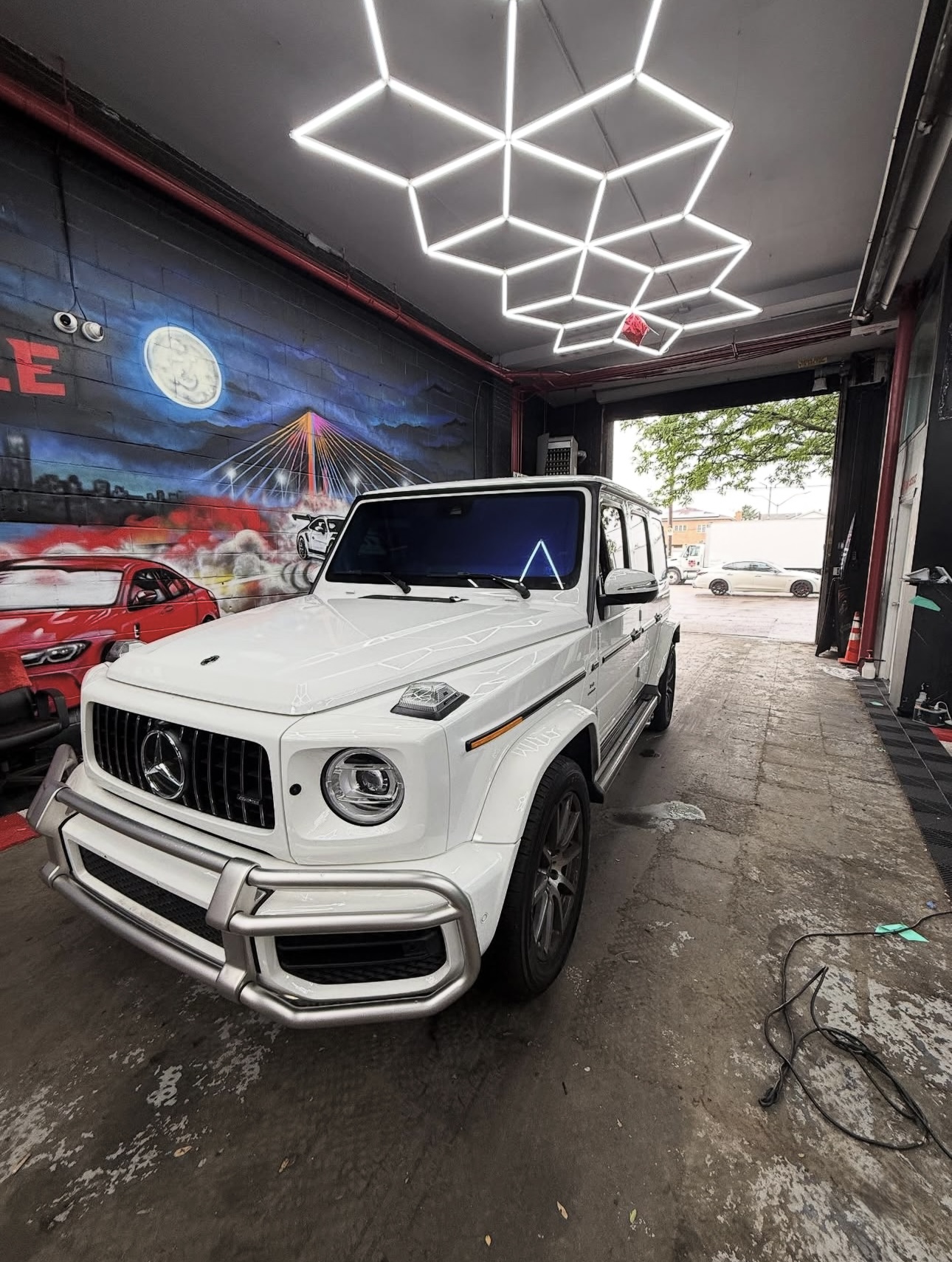 White Mercedes G63 AMG inside the detail bay
